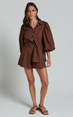 Amalie The Label - Noemie Linen Blend High Waisted Belted Tailored Shorts in Chocolate
