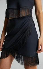 Lassey Mini Skirt - Fringe Trim Wrap Skirt in Black
